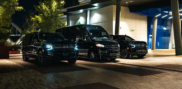 Fleet of luxury black cars and executive SUVs for Mak Louren Chauffeur Service Boston.