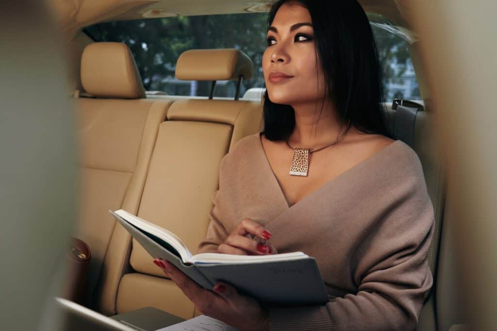 Luxury chauffeur service with professional driver in a high-end car. Perfect for business and specia.